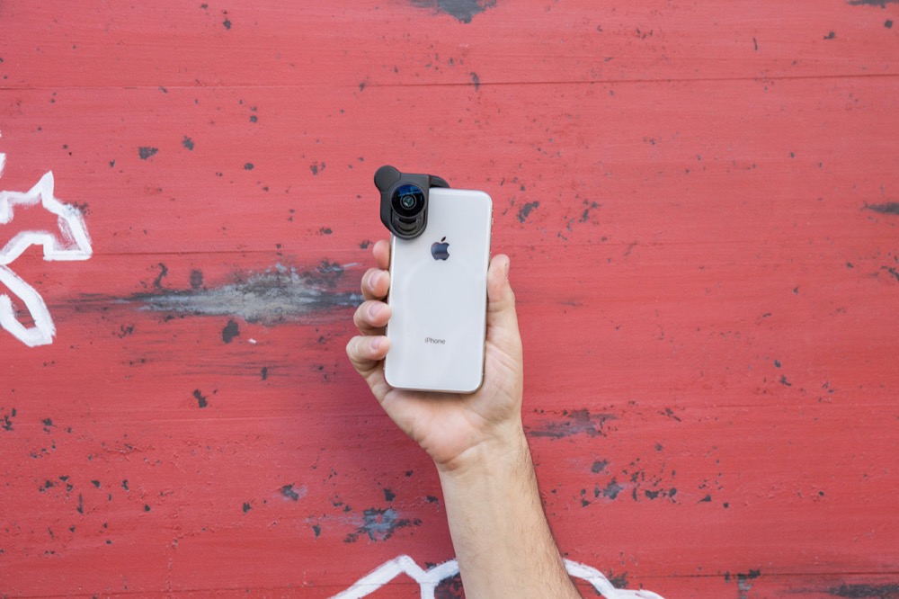 The olloclip Mobile Photography Box Set for iPhone X features interchangeable lenses that align with both front and rear cameras and can be instantly adapted to any shooting environment. Users can enhance their field-of-view and shoot wider and closer than with the built-in camera alone. (PRNewsfoto/olloclip)
